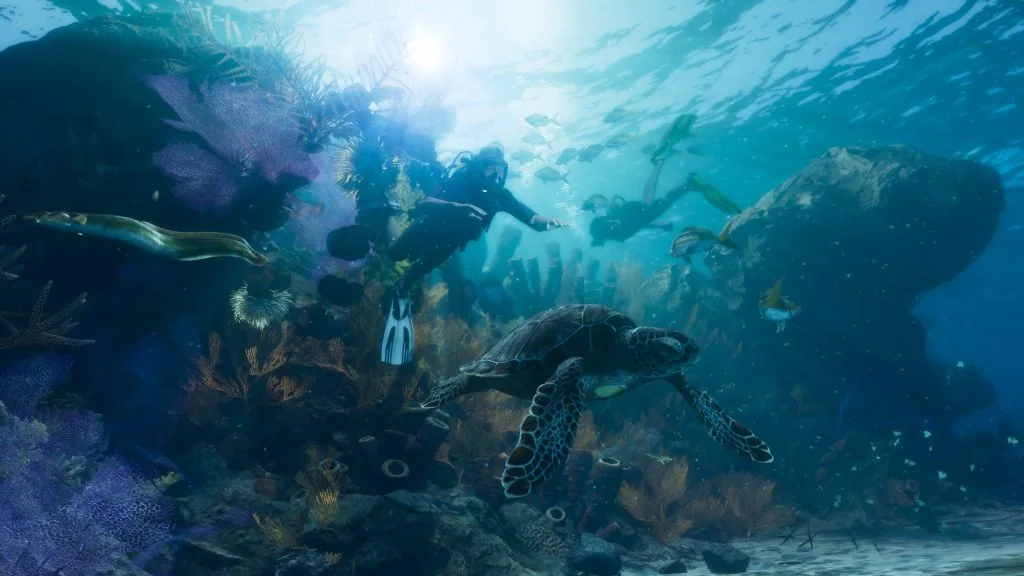 Scuba divers swimming beside a sea turtle and coral in the Leonida Keys in GTA VI