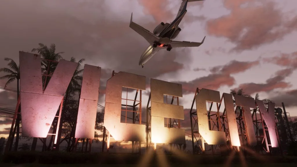 A private jet flying above the Vice City sign at sunset in GTA VI