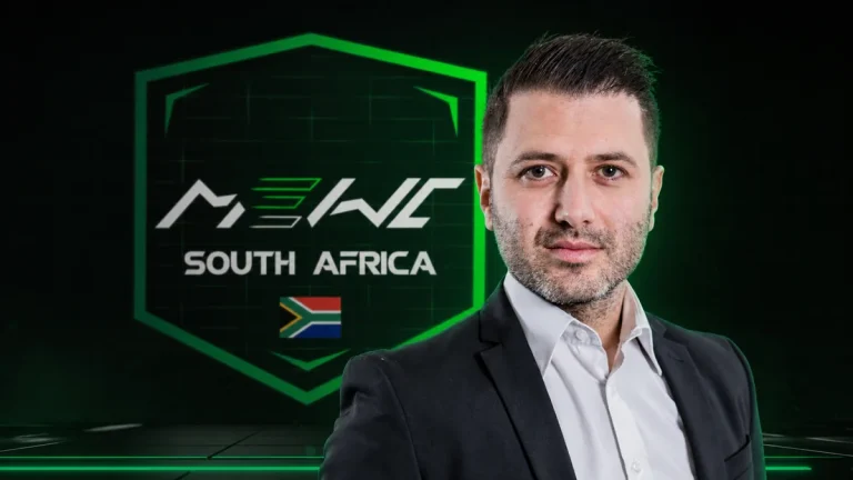 Adam Jacobson with the MEWC South Africa emblem behind him
